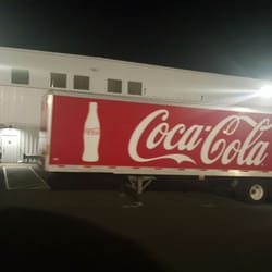 ls Coca Cola trailer in yard at night